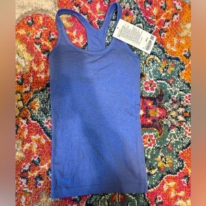 BRAND NEW Ebb to Street tank Lululemon size 2 (color wild indigo)